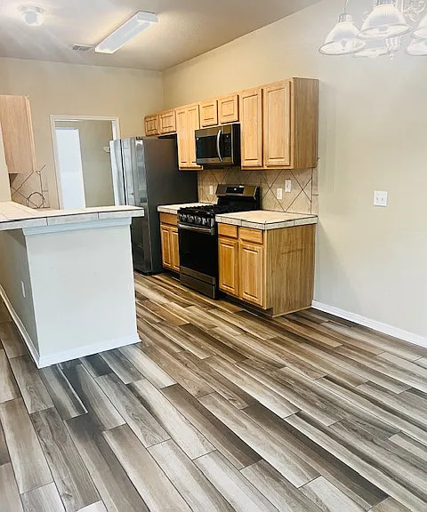 From living room looking into kitchen.