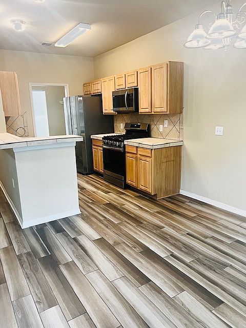 From living room looking into kitchen.