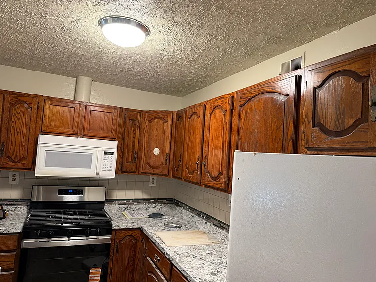 7507 Magarity Rd — Photo 10