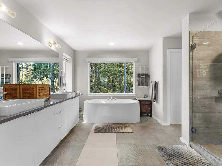 Primary Bathroom, stand alone shower, tub and separate toilet room.