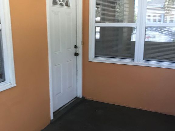 screened in front porch and front entry