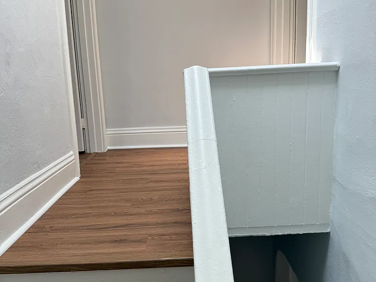 Second floor landing, front bedroom on right, second bedroom and bath on left