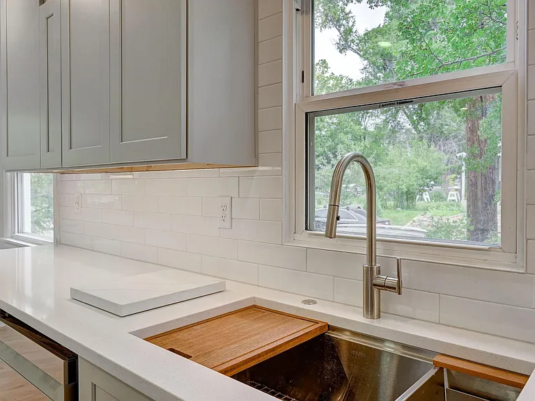 Kitchen with new double sink- includes cutting boards and strainers