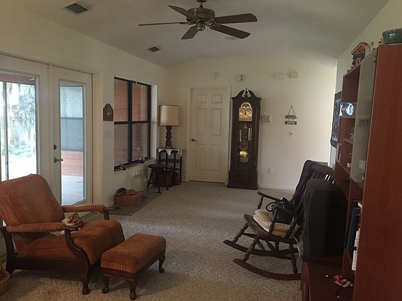 Doors out onto screen porch