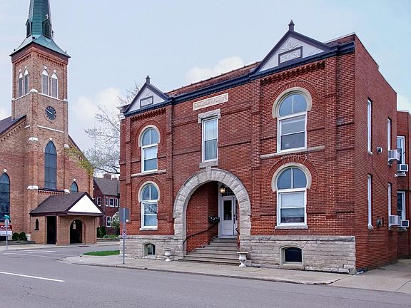 The building is across the street from St. Joseph Catholic Church.