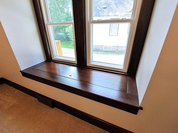 built in cedar chest opens to reveal a great cabinet for blanket storage.