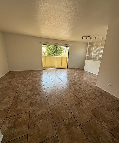 Dining Room looking into Living Room with private balcony