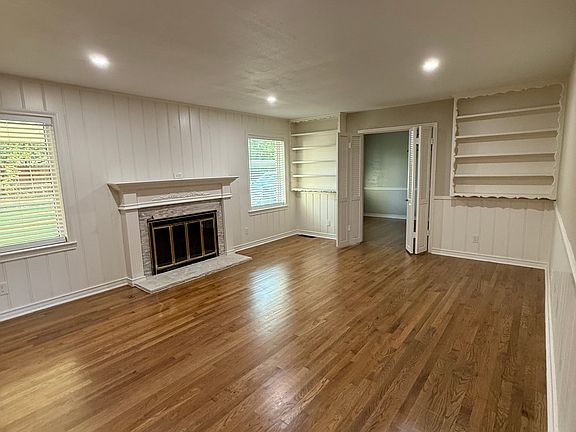 Living room showing entrance to the dining room.