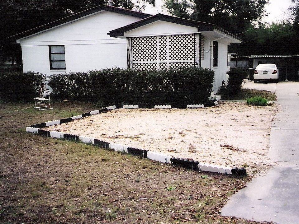 home w/driveway on right