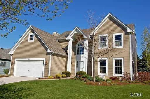 Concrete driveway*paver walkway and porch* new siding and roof