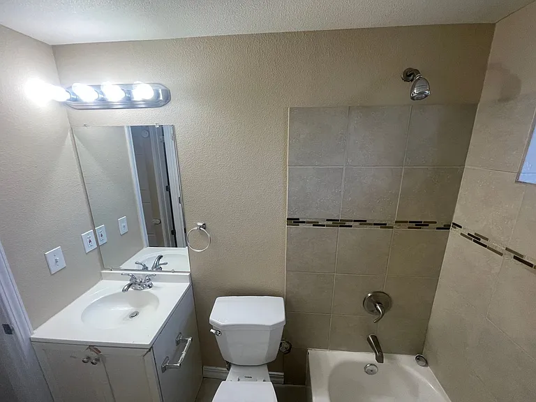 2BD Garden-Level Home | Off-Street Parking — Photo 24