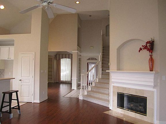  Wood floor in family room, formal dining and living room.