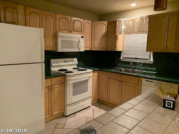 Oak cabinets, stone counters