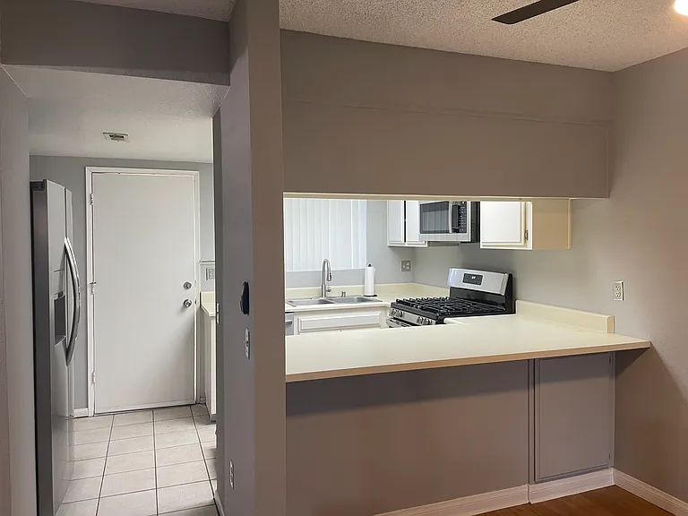 Kitchen. Brand new microwave, dishwasher and Stove. Newer refrigerator.