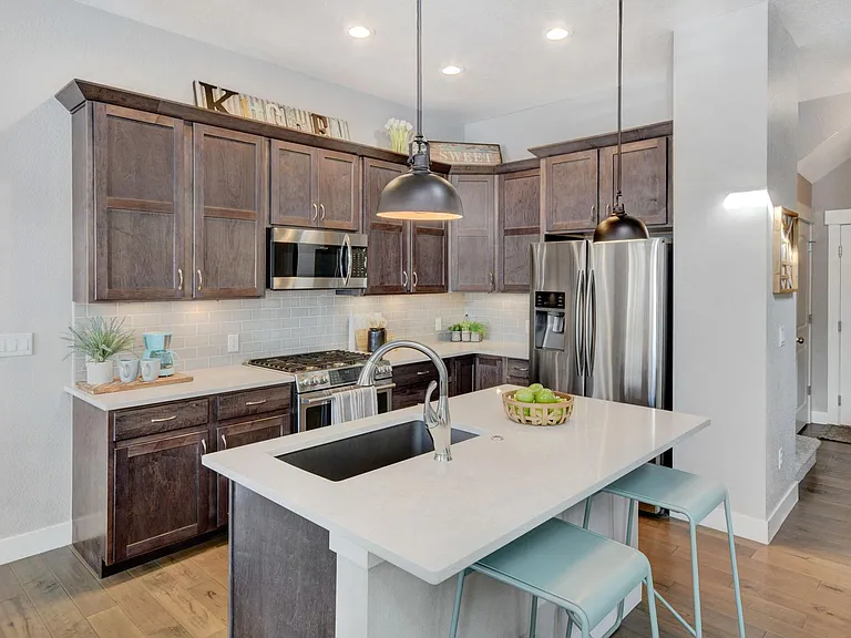 Stainless Appliances, Gas Range, Dishwasher, Refrigerator, Quartz Countertops, Pantry