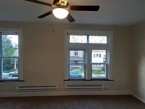view from doorway into front bedroom, 2nd floor, supplementary electric heat