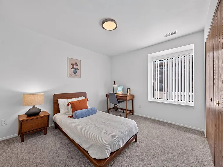 Spacious Bedroom with Ample storage at Lakeside Village Apartments in Clinton Township, MI