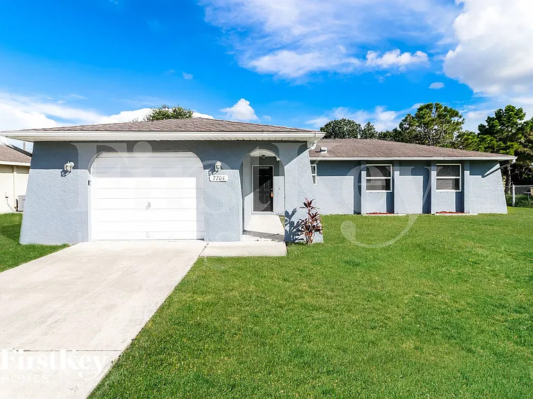 7704 Riverdale Dr — Photo 1