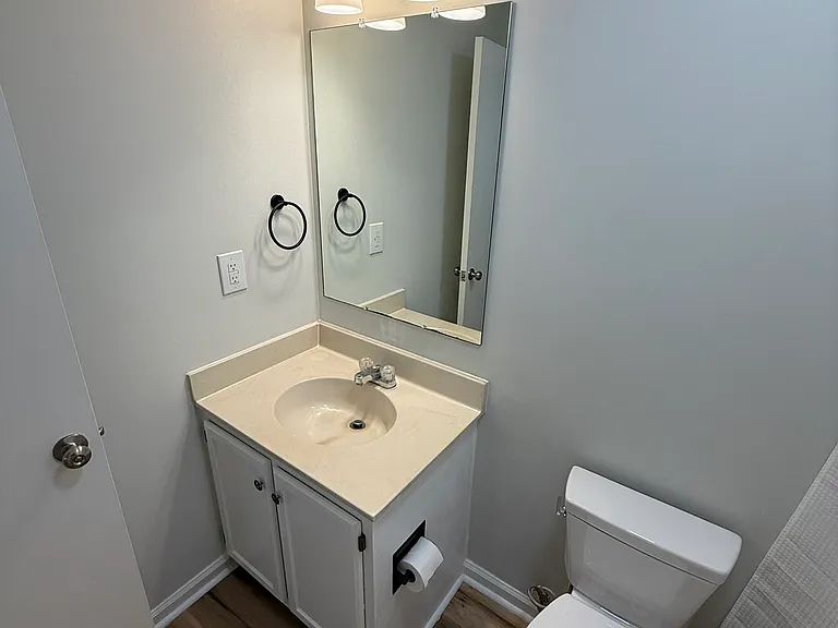 Secondary Bathroom with brand new toilet (enter from Hallway)