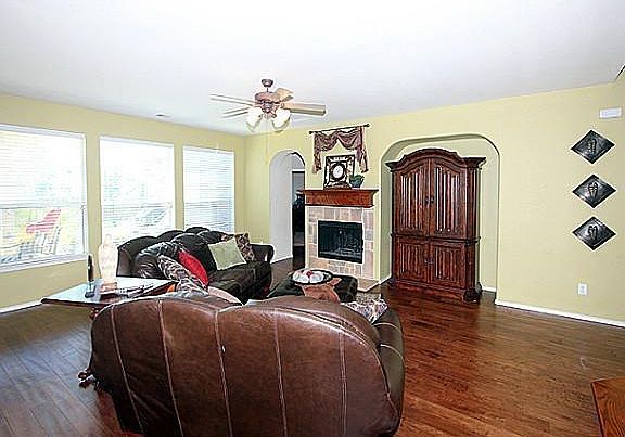 Living room with fireplace and storage closet