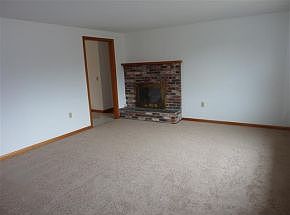 Brick Fireplace/New Carpet