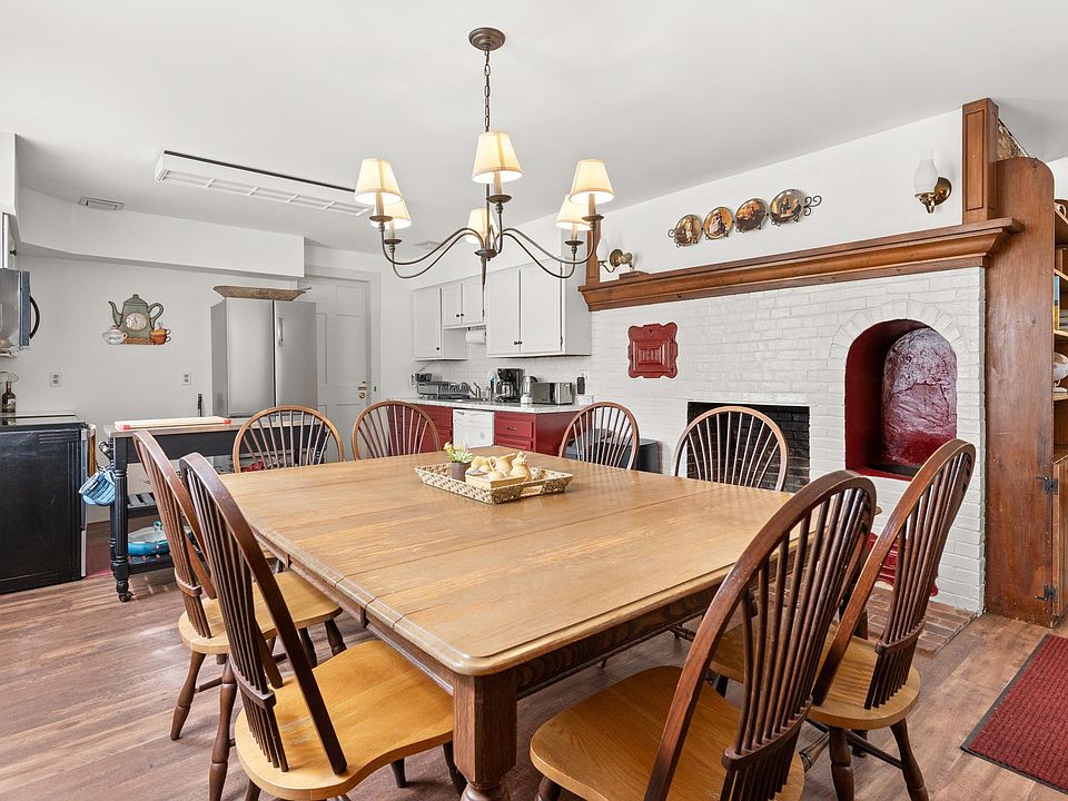 Gather around this charming farmhouse table with room for all_perfect for winter feasts and fireside memories.