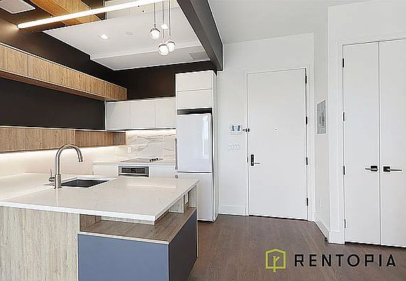 2nd image of 125 Borinquen Pl #415