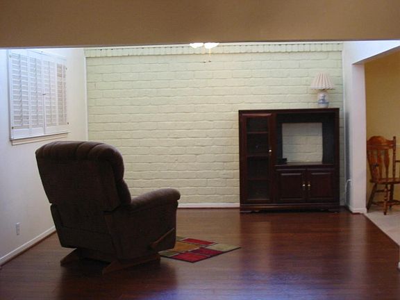 An atrium was incorporated into  a flexible space for formal dining/ study or den.