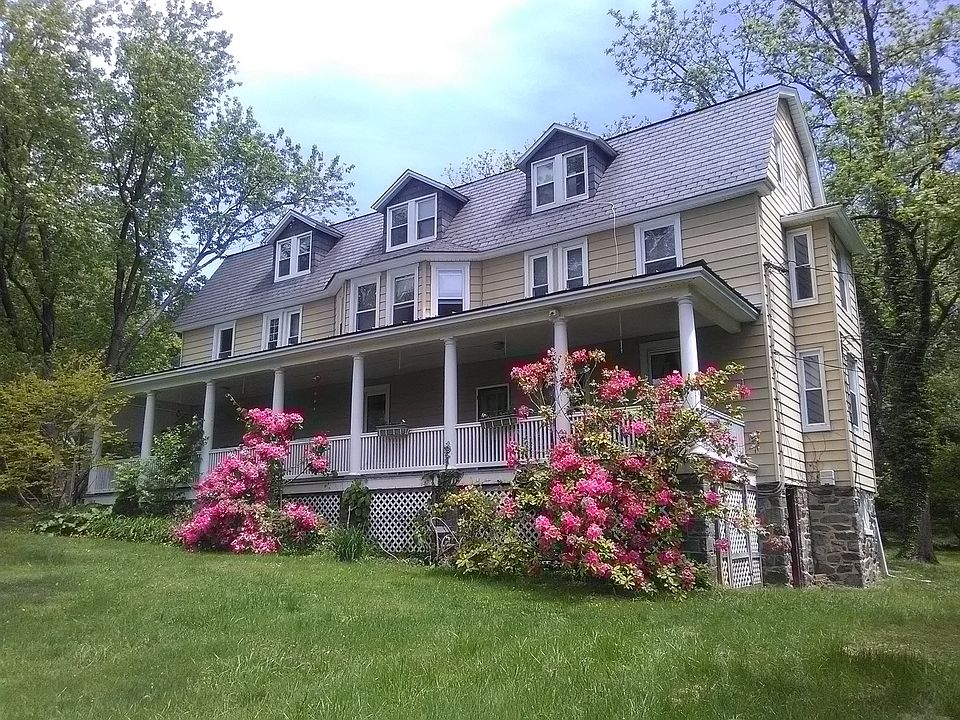 Apartment is left half of top 2 floors