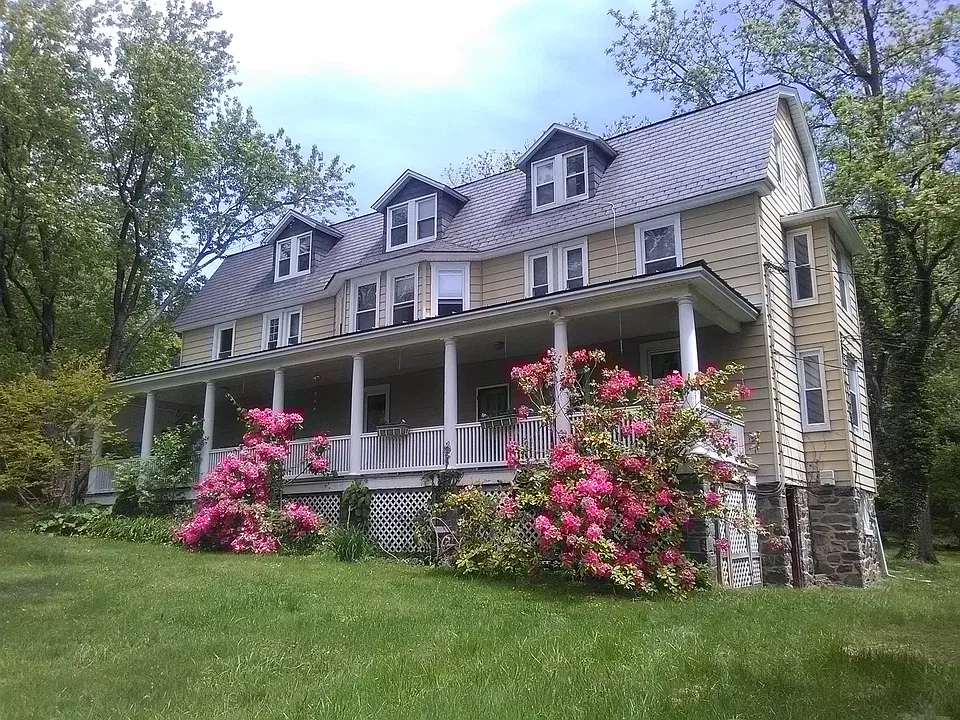 Apartment is left half of top 2 floors