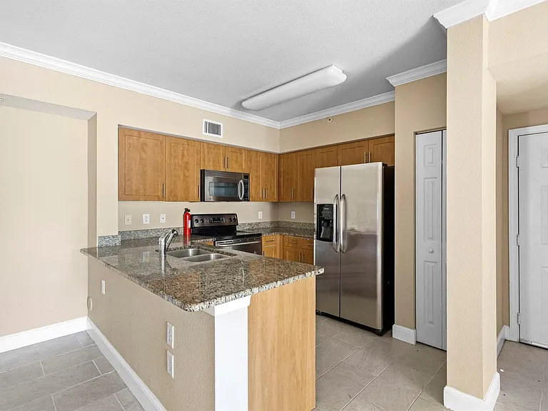 6450 Emerald Dunes Dr #103 — Photo 9