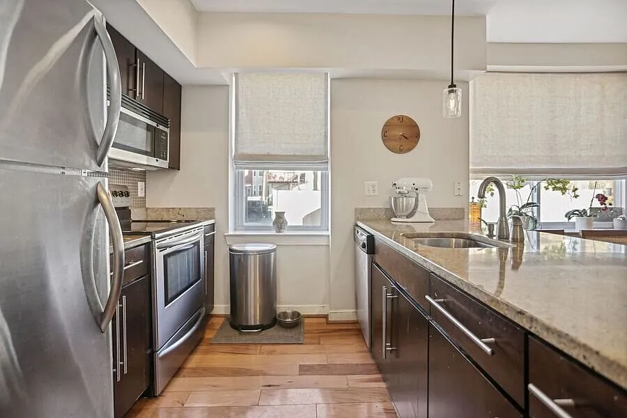 Bright 2-Bedroom Condo in Hill East - Parking and Storage Included + 1 Month Free! — Photo 2