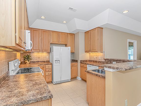 3rd image of 8855 Radcliff Dr NW Unit 56B