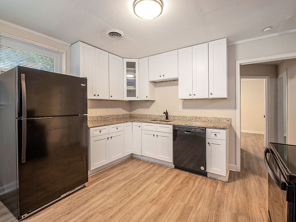 Kitchen with stove/oven, refrigerator, and dishwasher