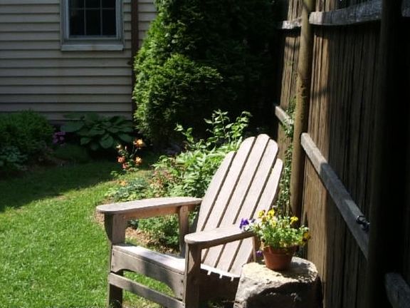 Professionally landscaped sun garden and lawn