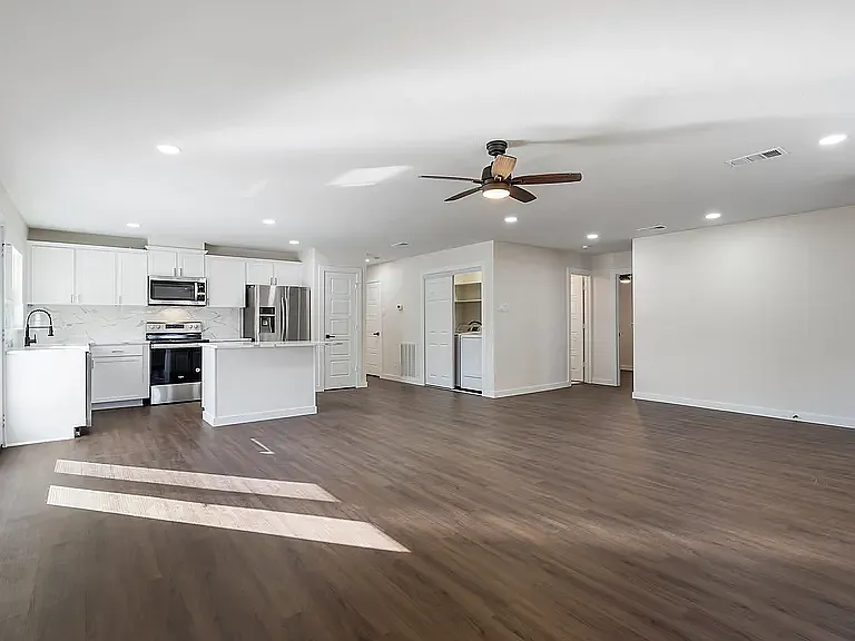 Spacious living room with natural light.
