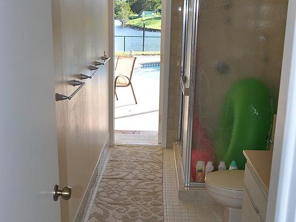 Full bath with access to the pool