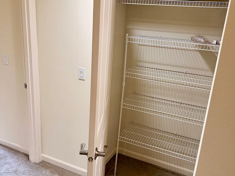 second hallway closet at end of hallway. bedroom 2 on left and bathroom on right