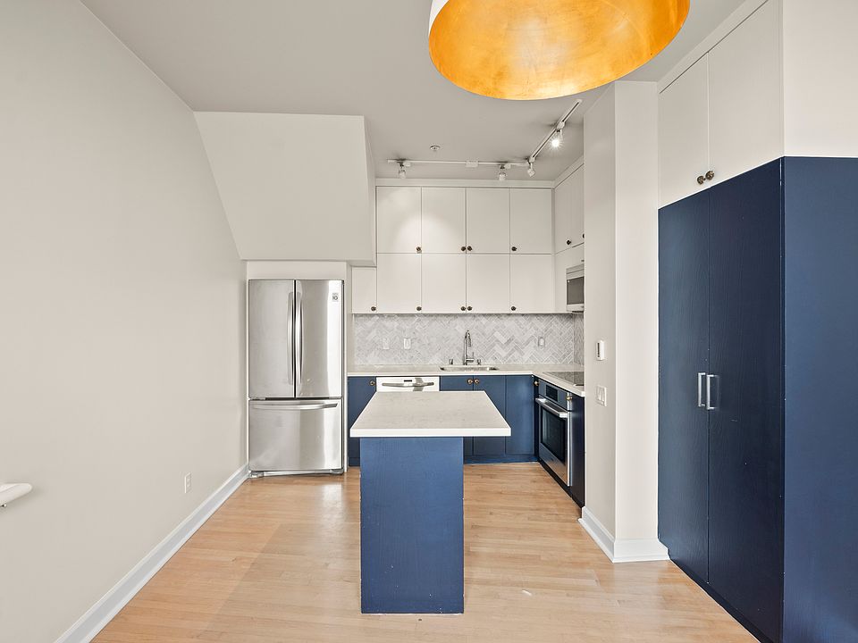 Updated kitchen with stainless steel appliances.