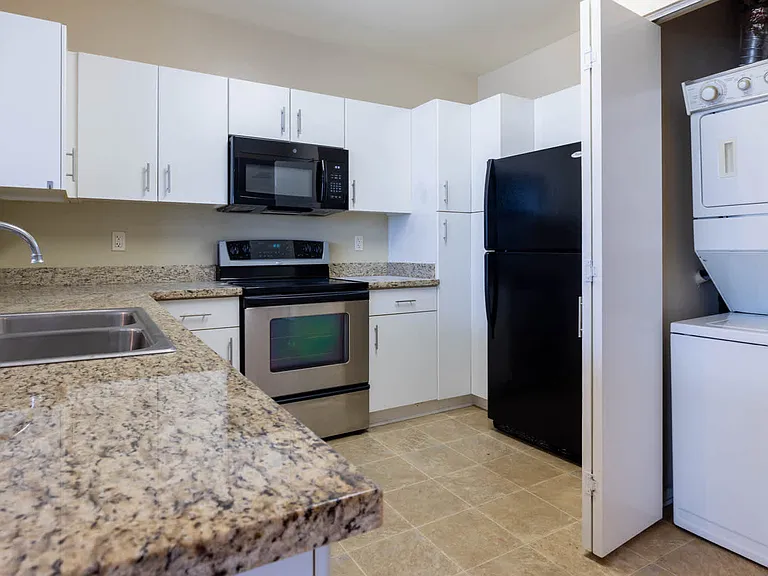 Kitchen with In-home Washer and Dryer