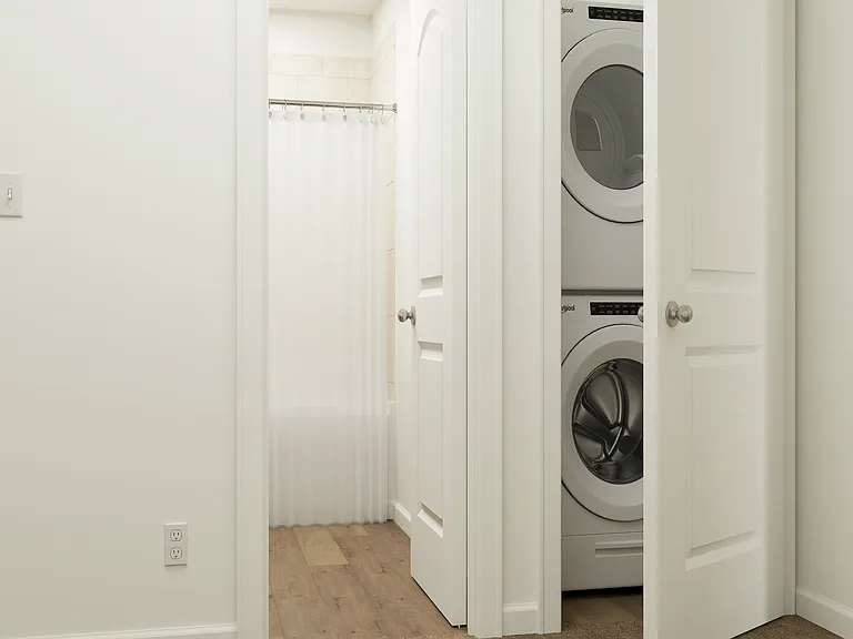 The washer and dryer are located upstairs.