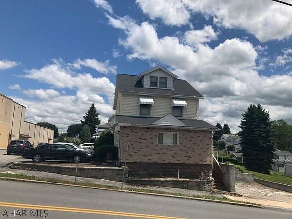 Side of house. Off street parking on right of picture.