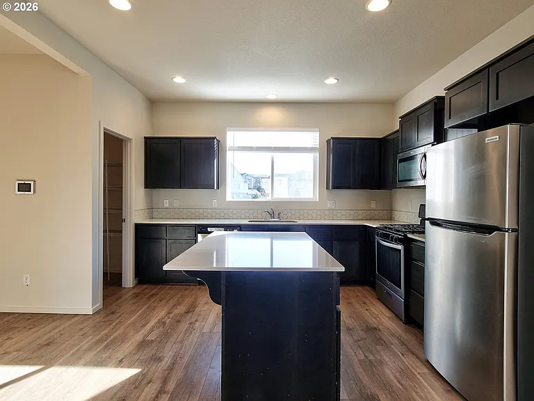 7751 NW Spirea St — Photo 22