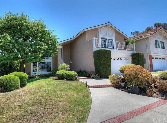 Separate walk way leads to entry.