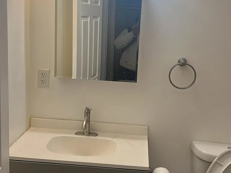 Updated bright bathroom with new fixtures.