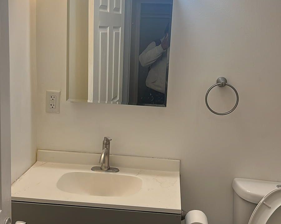 Updated bright bathroom with new fixtures.
