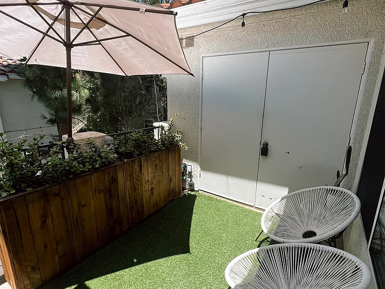 outdoor space with patio closet washer dryer