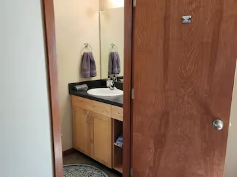 .5 bath attached to downstairs bedroom