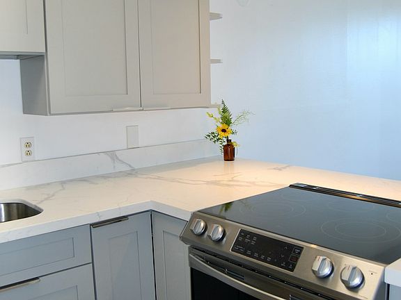Kitchen with instant hot water and below counter storage