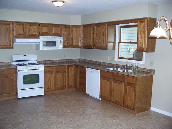 KItchen w new appliances, sink, fixtures, floor and countertops
